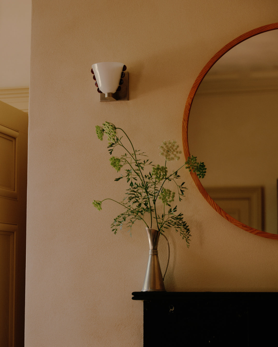 Calla Sconce // Small / Opaline with Amber Embellishments / Pewter // Photo by William Jess Laird