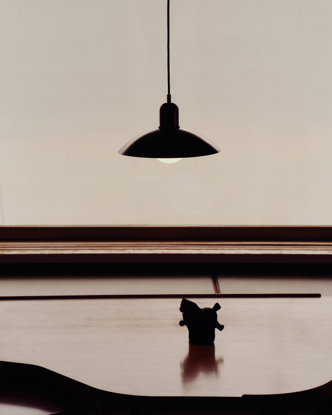 Brass Arundel Orb Pendant // Patina Brass / Patina Brass // Photo by Bastian Achard